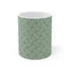 Mystic Mirage white ceramic cup with green sublimation print.