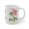 A lovely two colored Rosa Mundi rose on a white porcelain cup - handle right